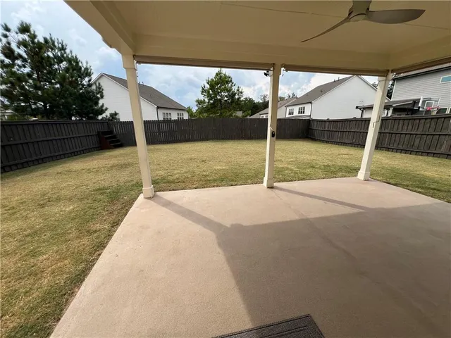 a bathroom with a toilet sink and vanity