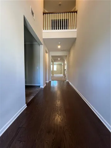 a kitchen with stainless steel appliances granite countertop a lot of counter top and stove