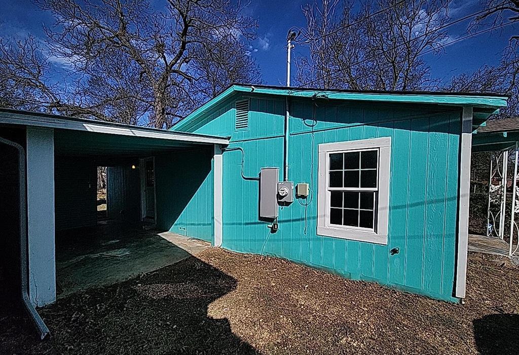 108 Monroe Street Cleburne, TX 76033 - Photo 3 of 14 a view of a house with a yard