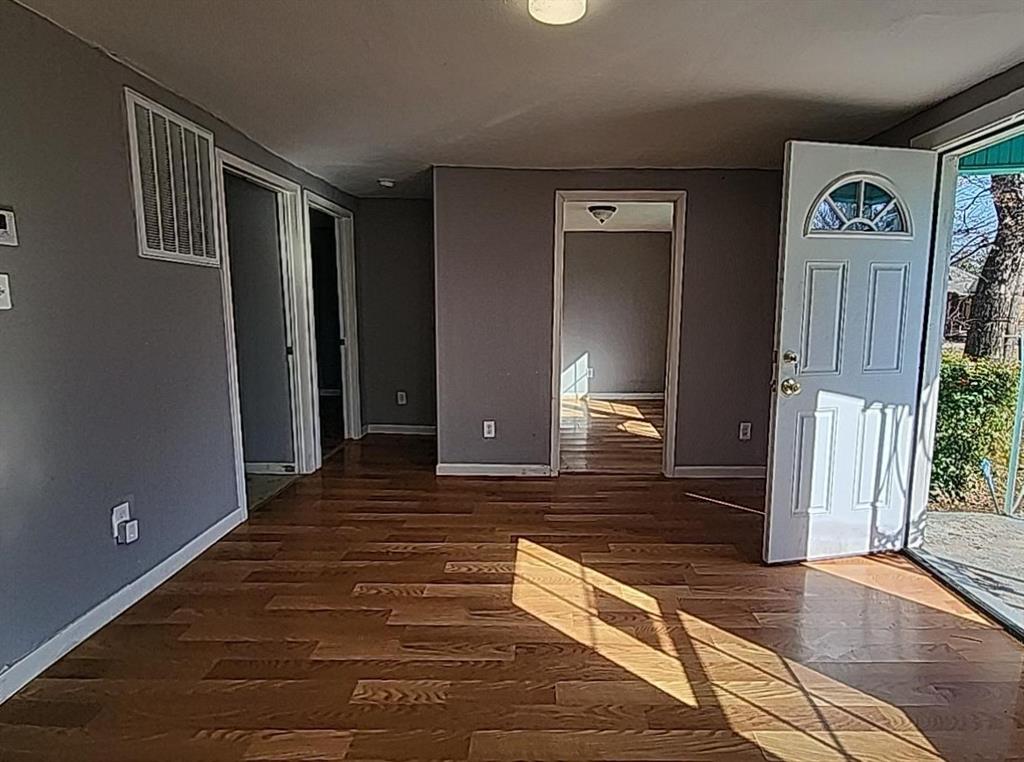 108 Monroe Street Cleburne, TX 76033 - Photo 8 of 14 a view of front door of house