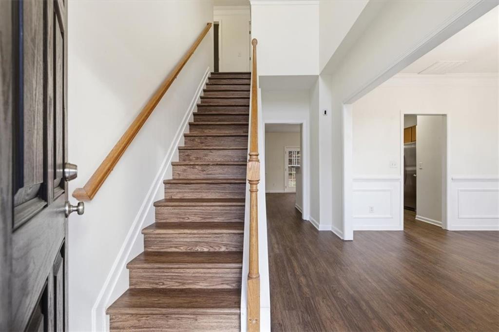 836 Topaz Valley Canton, GA 30114 - Photo 4 of 33 a view of an entryway with wooden floor