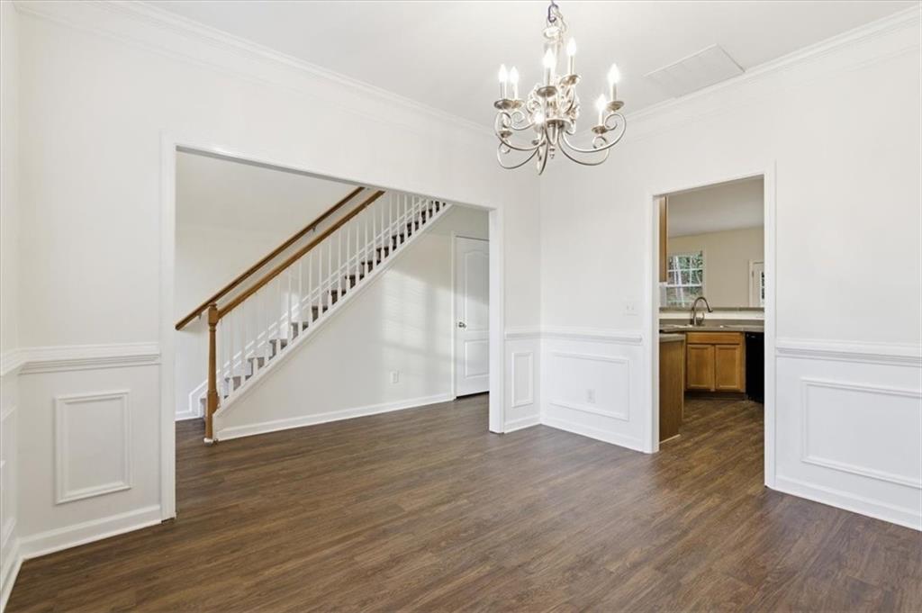 836 Topaz Valley Canton, GA 30114 - Photo 6 of 33 a view of an entryway with wooden floor