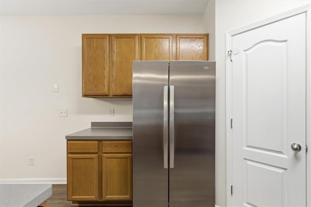 836 Topaz Valley Canton, GA 30114 - Photo 9 of 33 a bathroom with a refrigerator sink and cabinets