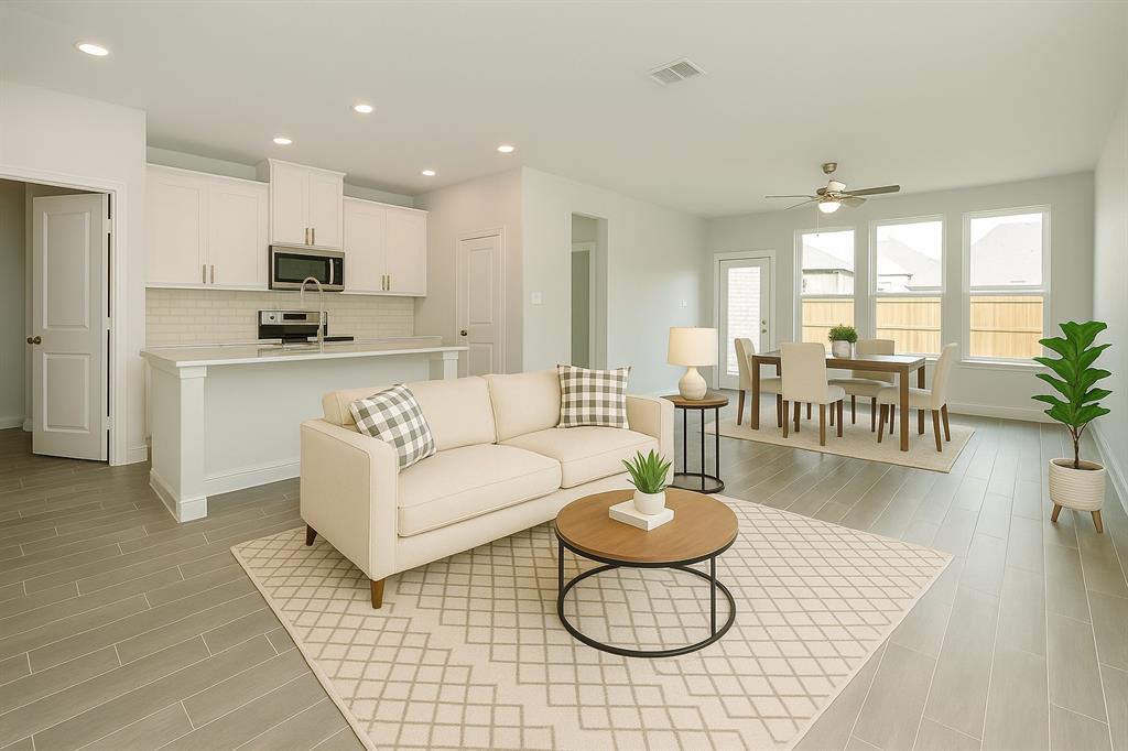 820 Portina Drive Anna, TX 75409 - Photo 2 of 25 a living room with furniture kitchen view and a dining table
