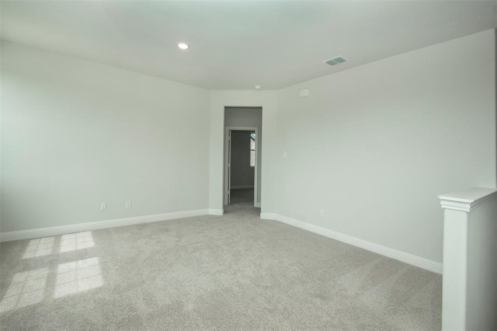 820 Portina Drive Anna, TX 75409 - Photo 21 of 25 an empty room with an entryway