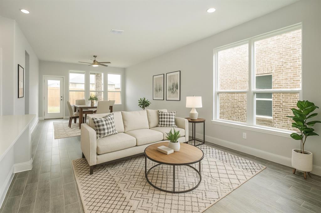 820 Portina Drive Anna, TX 75409 - Photo 3 of 25 a living room with furniture and a large window