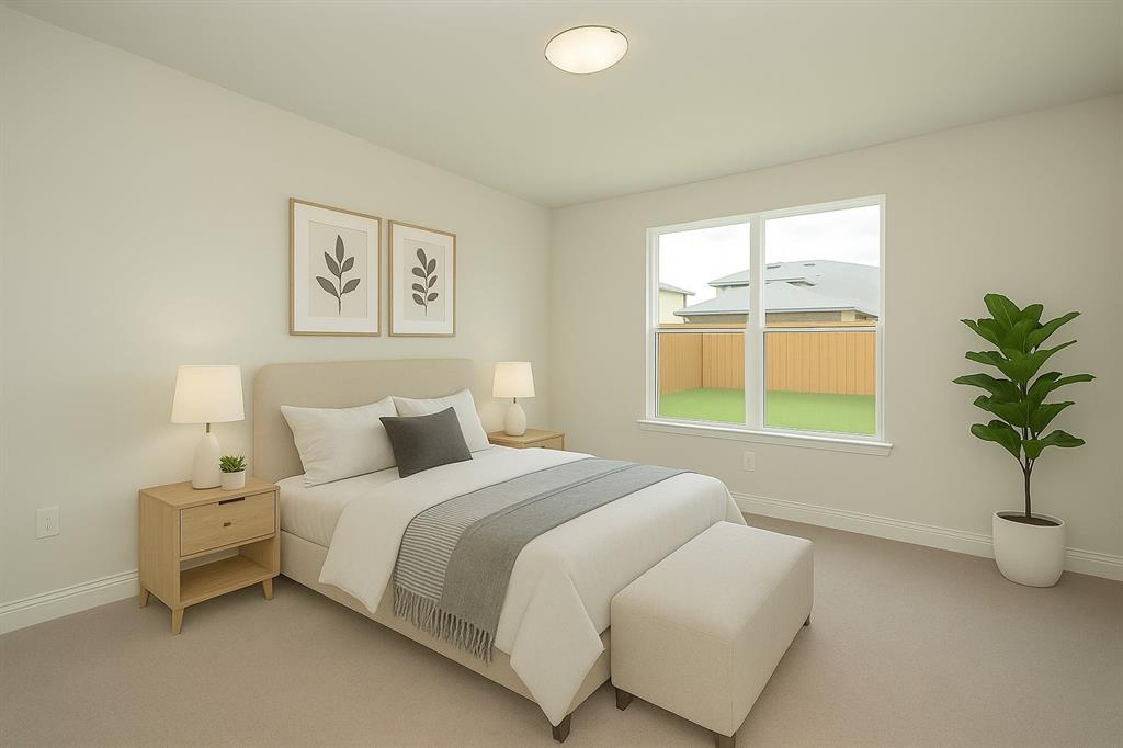 820 Portina Drive Anna, TX 75409 - Photo 10 of 25 a bedroom with a bed and a potted plant