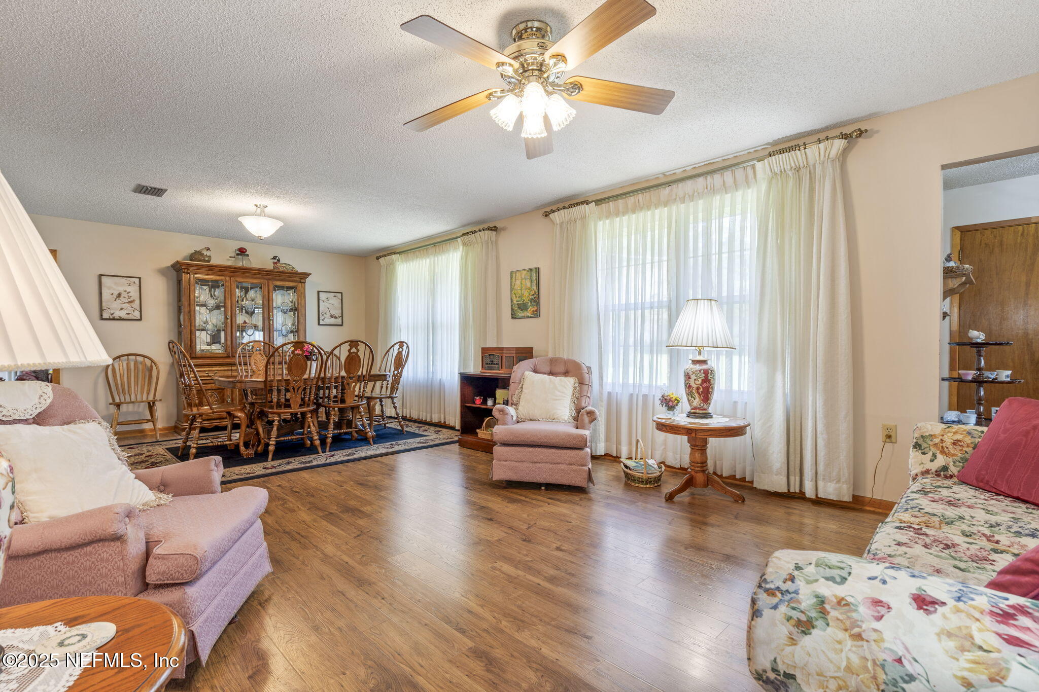 5893 George Hodges Road Macclenny, FL 32063 - Photo 29 of 56 a living room with furniture and a large window