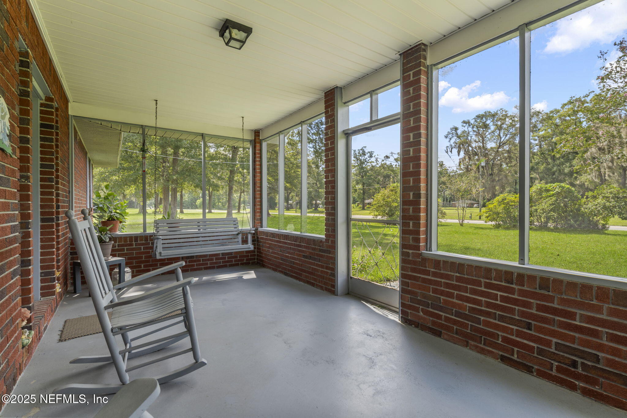 5893 George Hodges Road Macclenny, FL 32063 - Photo 39 of 56 a view of a large window with an outdoor space