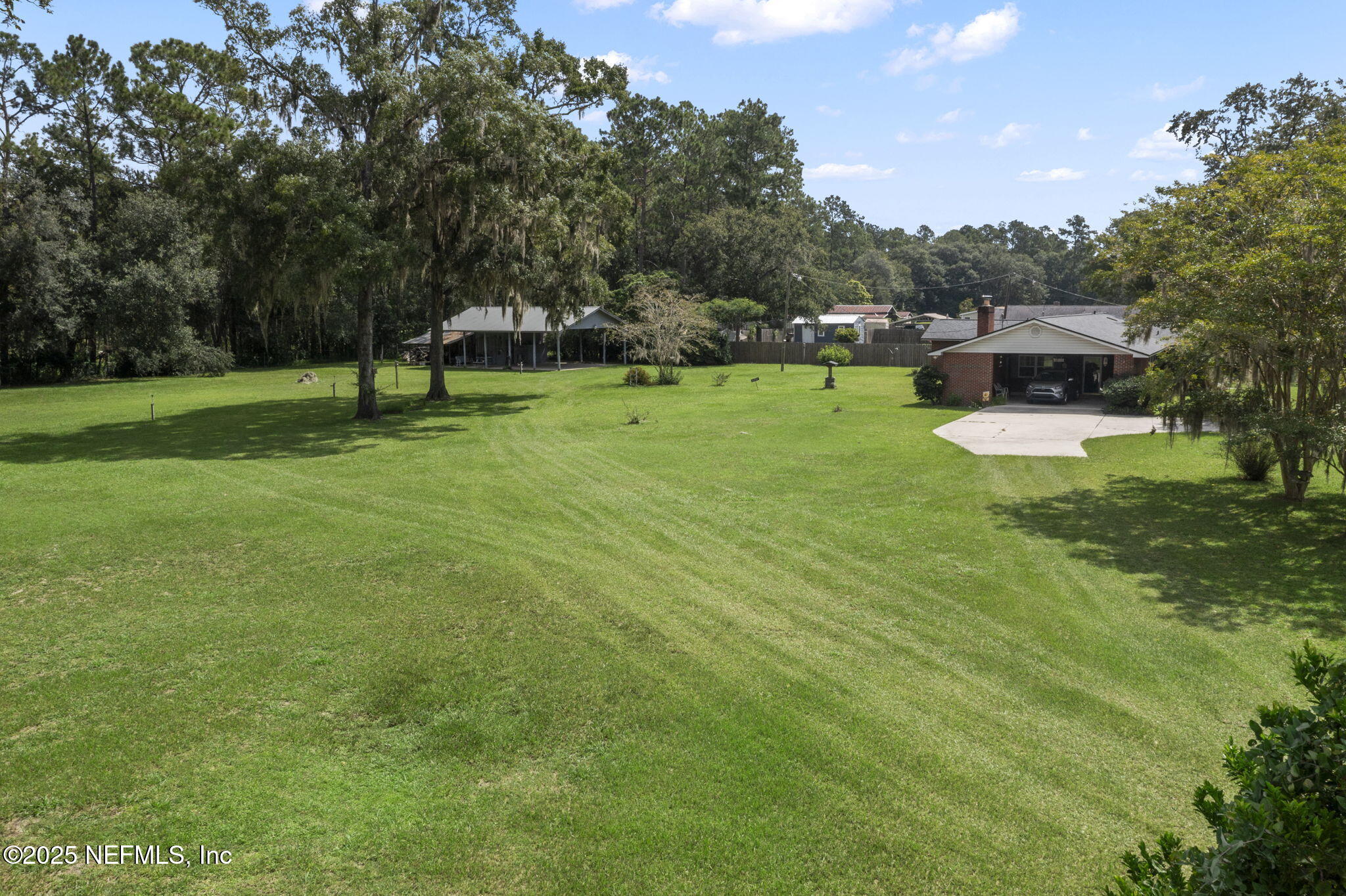 5893 George Hodges Road Macclenny, FL 32063 - Photo 43 of 56 a view of a house with a yard