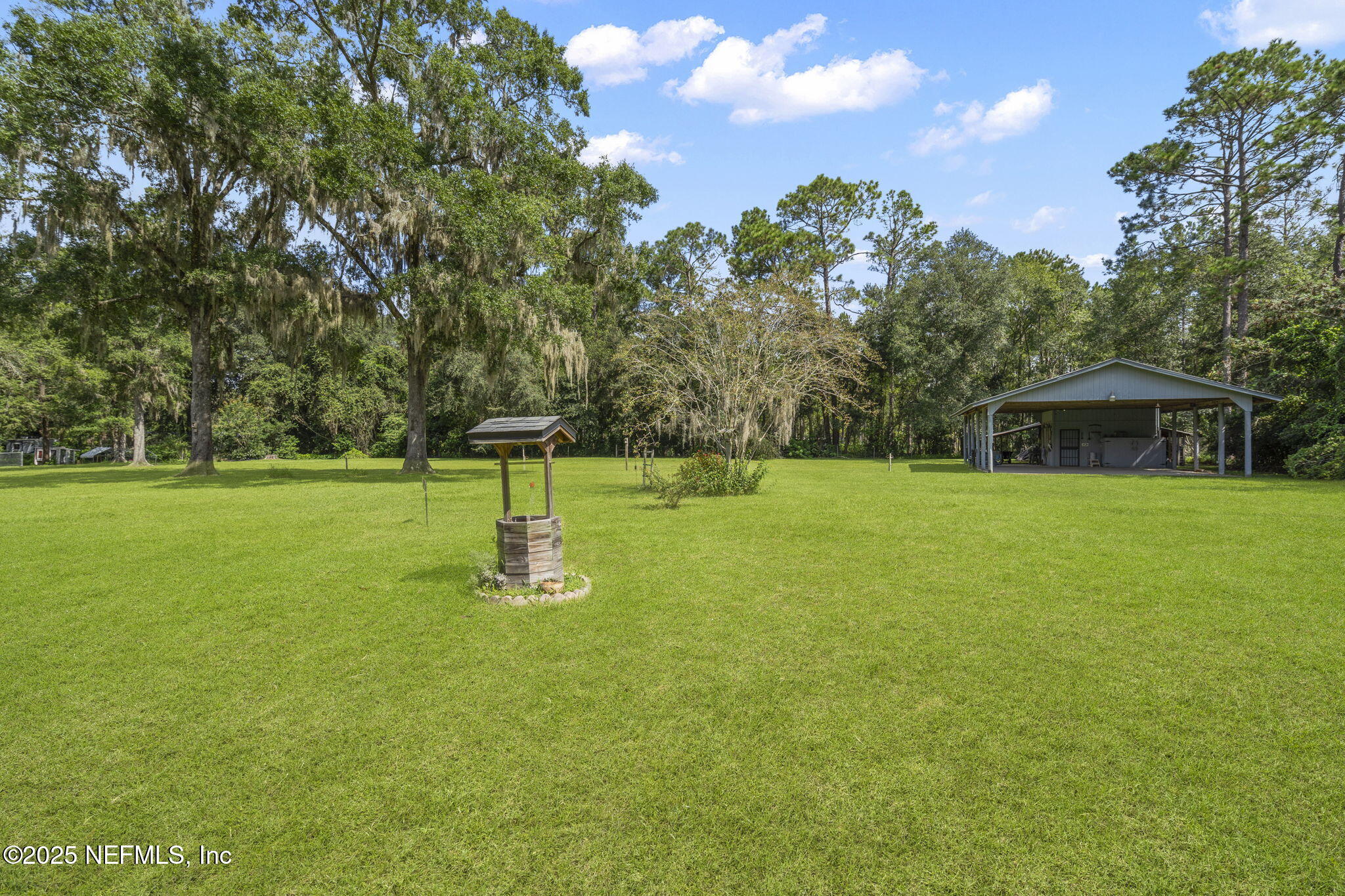 5893 George Hodges Road Macclenny, FL 32063 - Photo 48 of 56 a front view of a house with a yard