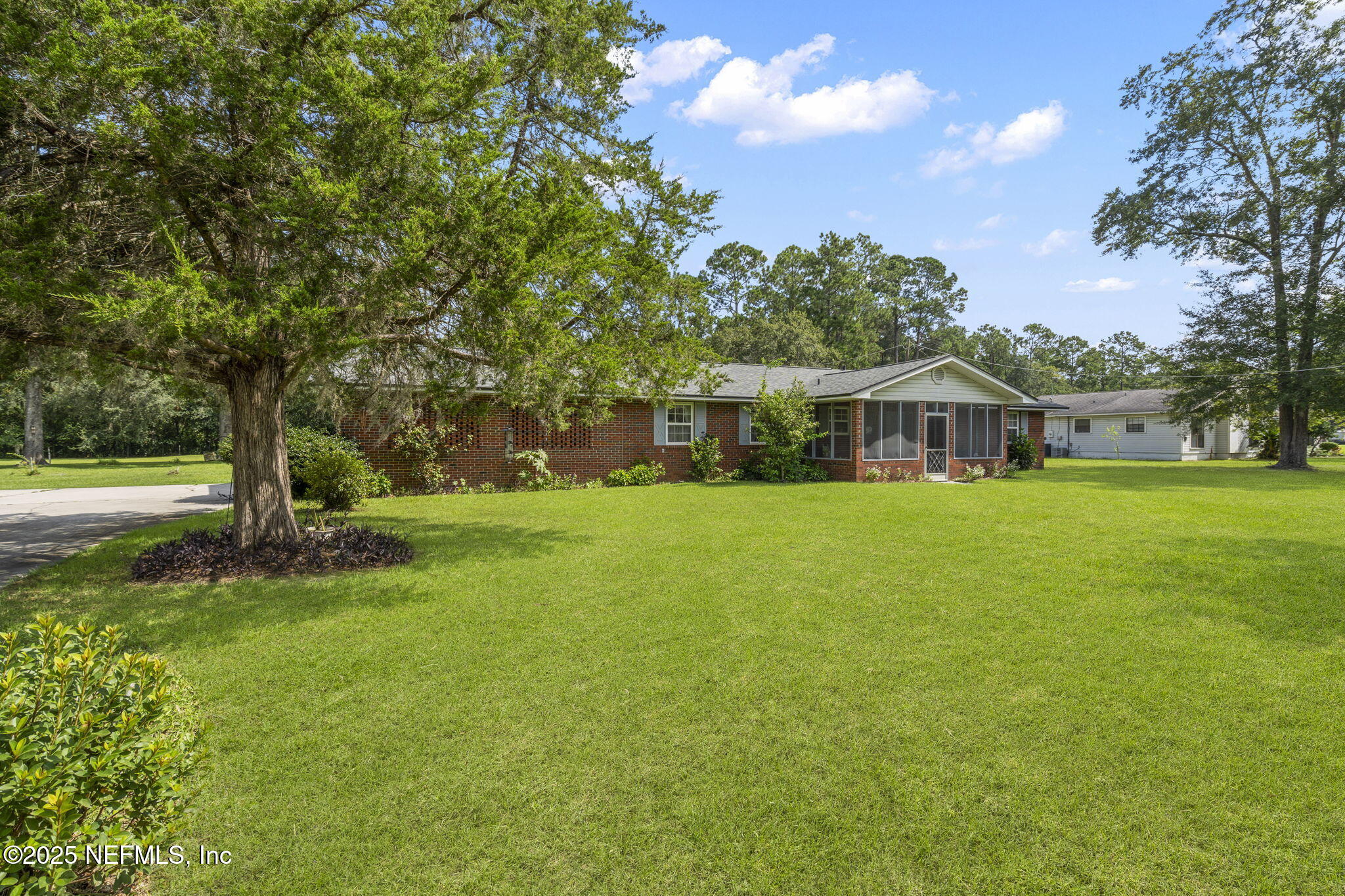 5893 George Hodges Road Macclenny, FL 32063 - Photo 4 of 56 a view of house with a outdoor space