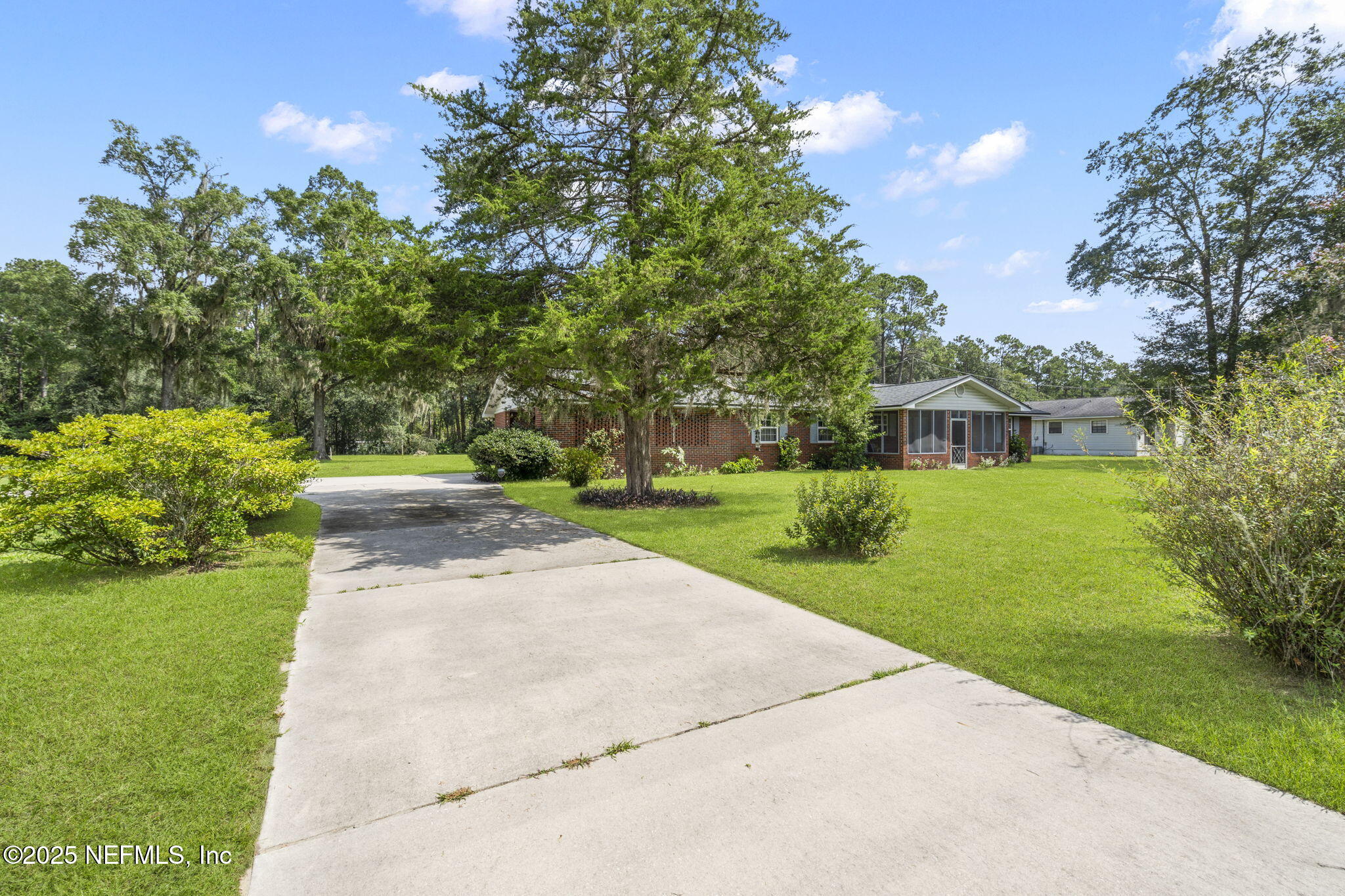5893 George Hodges Road Macclenny, FL 32063 - Photo 5 of 56 a view of a park with plants and trees