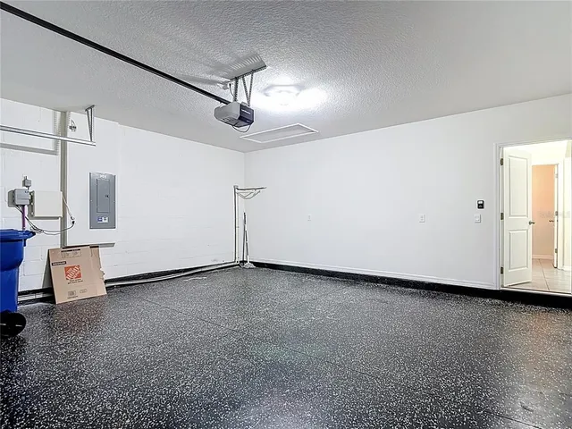 a close view of a utility room with dryer and washer