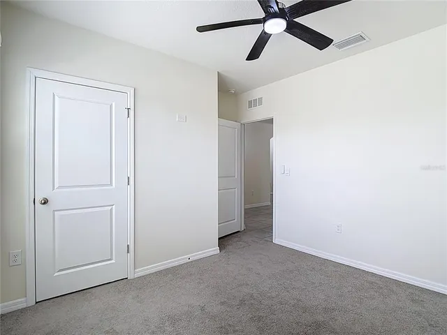 an aerial view of a swimming pool and outdoor space