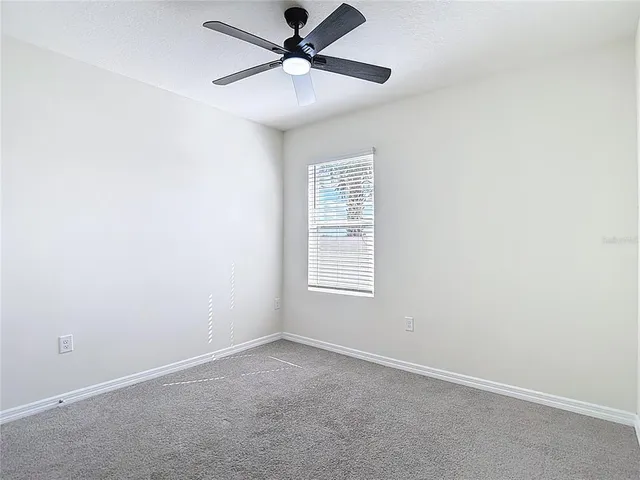 a view of a lake with houses in the back