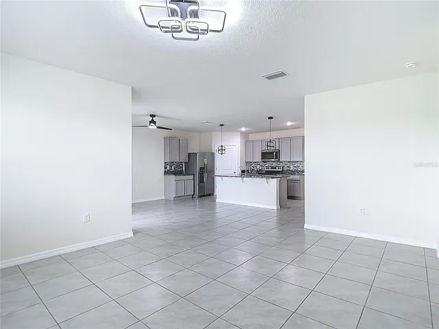 a view of a house with a swimming pool