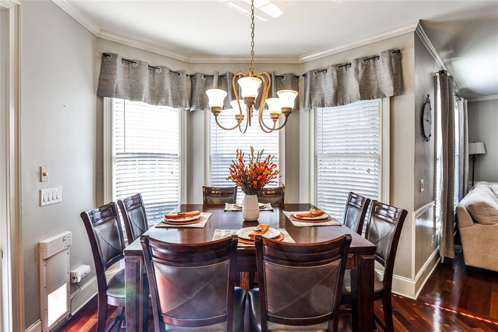 872 Pathview Court Dacula, GA 30019 - Photo 13 of 62 a view of a dining room with furniture window and outside view