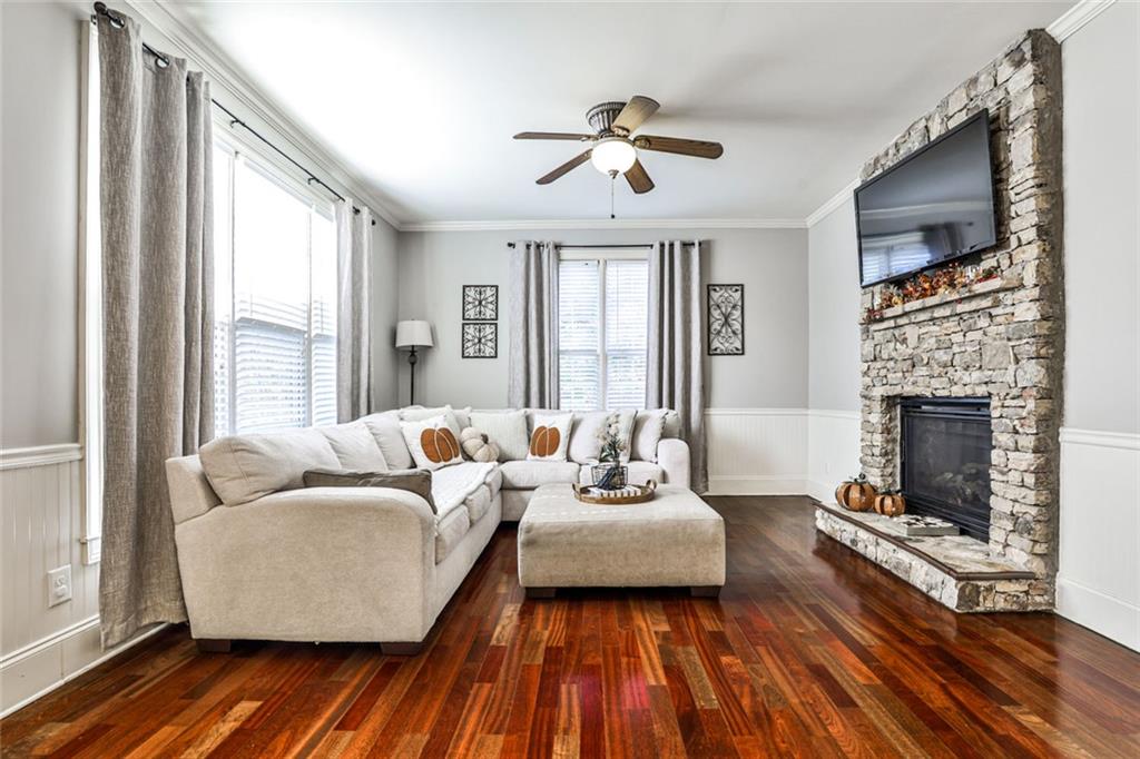 872 Pathview Court Dacula, GA 30019 - Photo 19 of 62 a living room with furniture and a fireplace