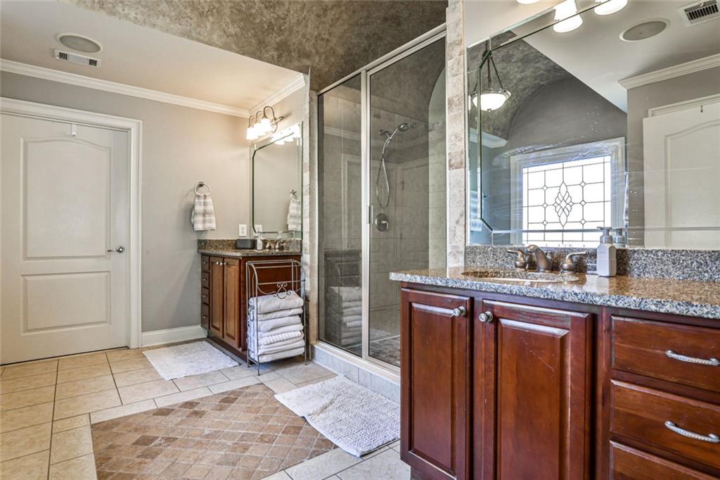 872 Pathview Court Dacula, GA 30019 - Photo 35 of 62 a kitchen with stainless steel appliances granite countertop a refrigerator and a sink