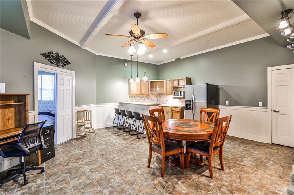 872 Pathview Court Dacula, GA 30019 - Photo 42 of 62 a view of a dining room with furniture
