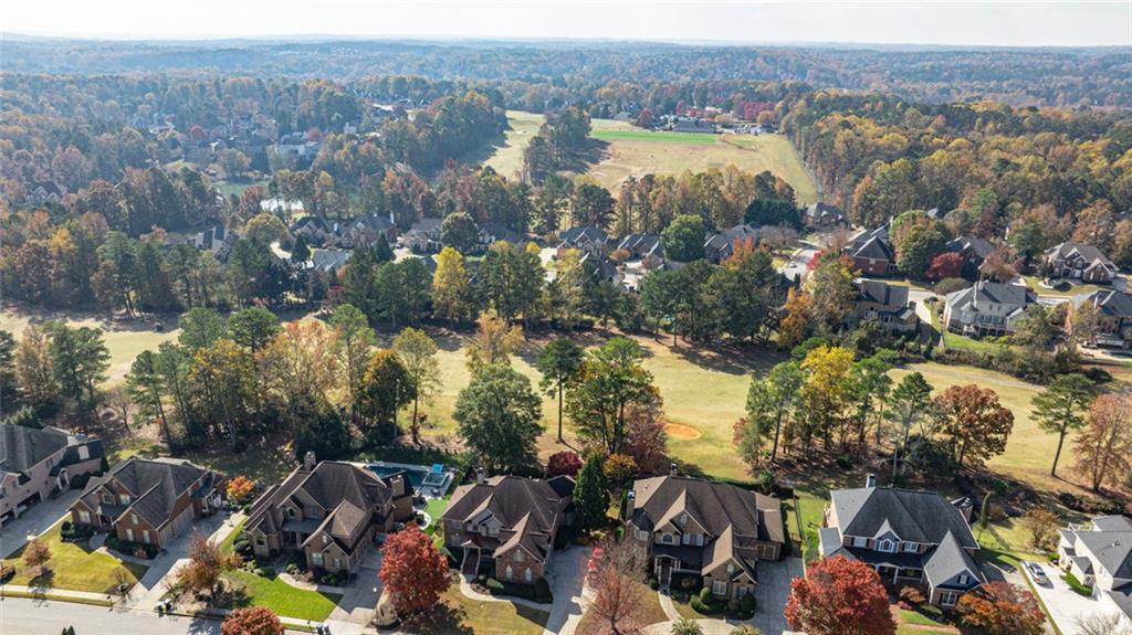 872 Pathview Court Dacula, GA 30019 - Photo 54 of 62 an aerial view of city and lake