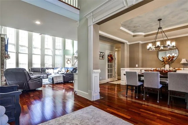 a living room with furniture and a rug