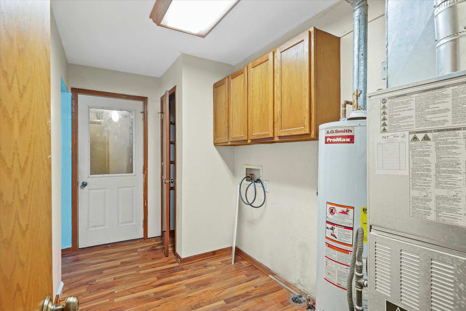 106 East Union Street Mahomet, IL 61853 - Photo 12 of 24 a view of an entryway with wooden floor
