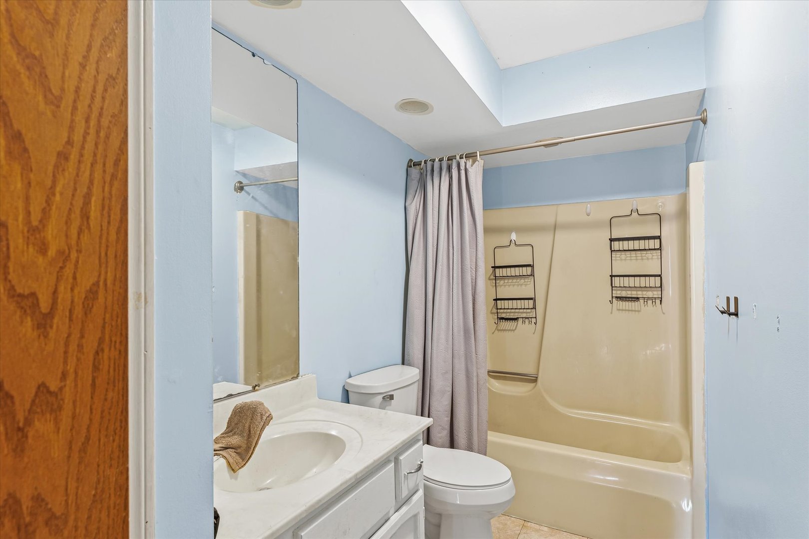 106 East Union Street Mahomet, IL 61853 - Photo 13 of 24 a bathroom with a granite countertop sink toilet and shower