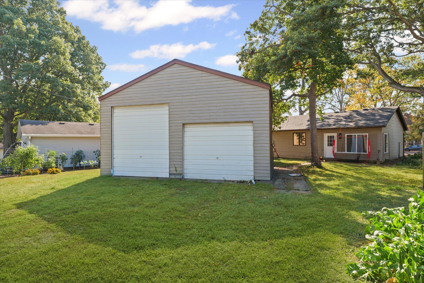 106 East Union Street Mahomet, IL 61853 - Photo 23 of 24 a front view of house with yard and trees