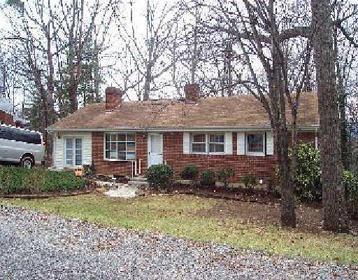 3067 Sedgefield Road Southwest Roanoke, VA 24018 - Photo 1 of 8 a front view of house with yard outdoor seating and barbeque oven