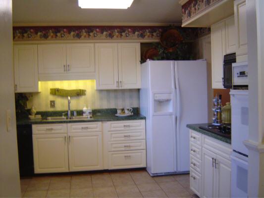 3067 Sedgefield Road Southwest Roanoke, VA 24018 - Photo 4 of 8 a kitchen with stainless steel appliances granite countertop a refrigerator and a stove