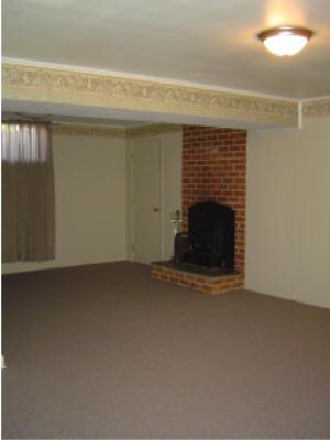 3067 Sedgefield Road Southwest Roanoke, VA 24018 - Photo 7 of 8 a view of empty room with fireplace