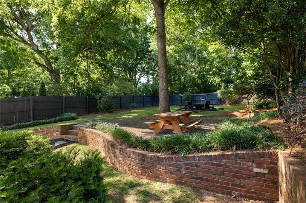 266 Atlanta Avenue Southeast Atlanta, GA 30315 - Photo 61 of 70 a view of a backyard with plants and large trees