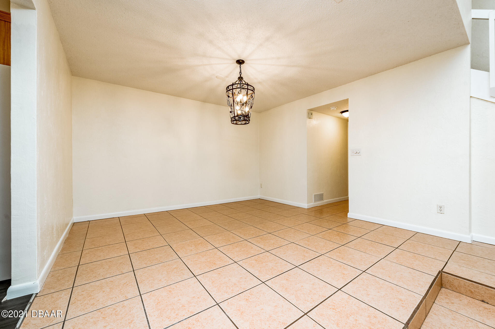 11 Birchwood Trail Ormond Beach, FL 32174 - Photo 4 of 24 a view of a room with tiles and wooden floor