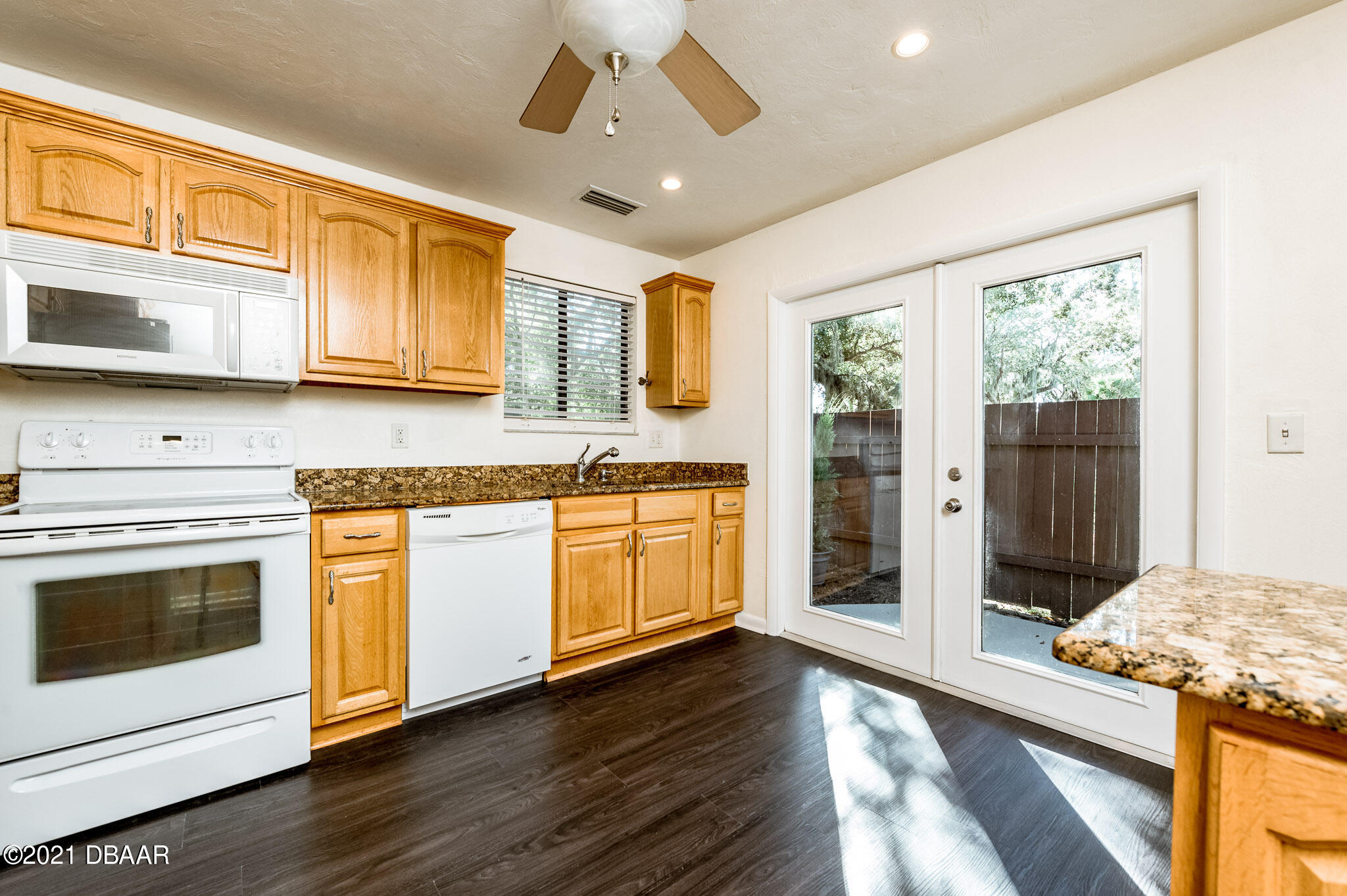 11 Birchwood Trail Ormond Beach, FL 32174 - Photo 7 of 24 a kitchen with stainless steel appliances granite countertop a stove and a refrigerator
