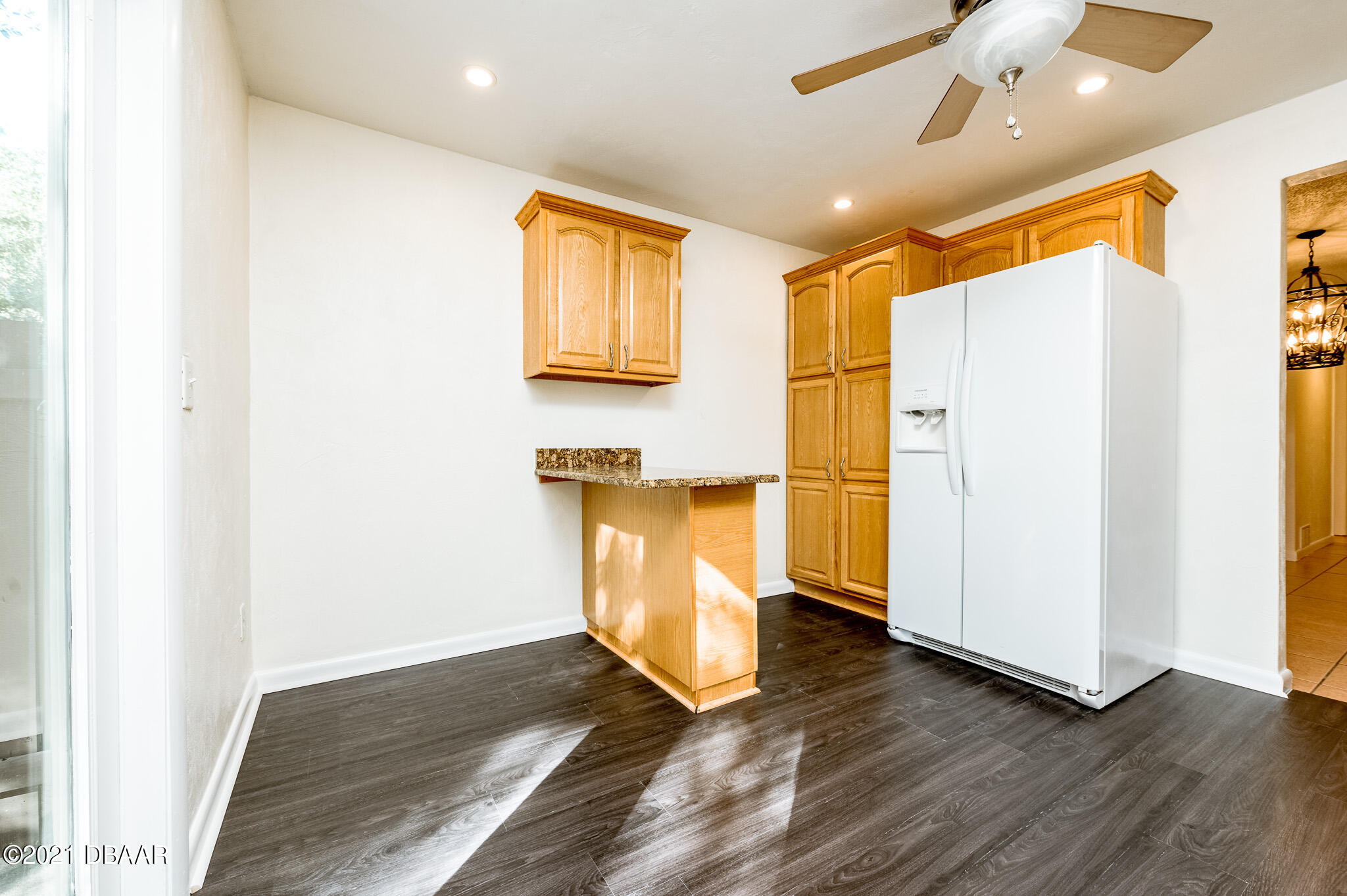 11 Birchwood Trail Ormond Beach, FL 32174 - Photo 9 of 24 a view of a storage & utility room with wooden floor