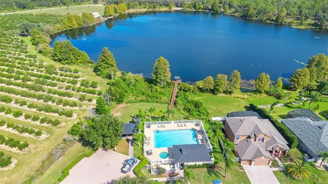 a front view of a house with a yard and pathway