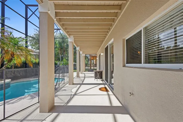 a view of a porch with wooden floor and outdoor space