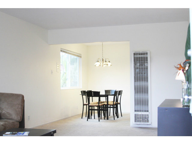 337 Monterey Road Pacifica, CA 94044 - Photo 5 of 21 a view of a dining room with furniture and wooden floor