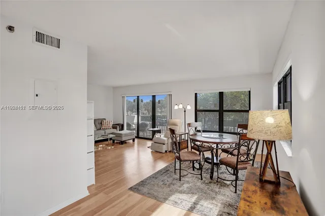 a view of a livingroom with furniture and a table