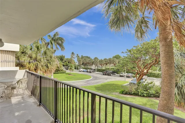a view of a chairs and table in the patio