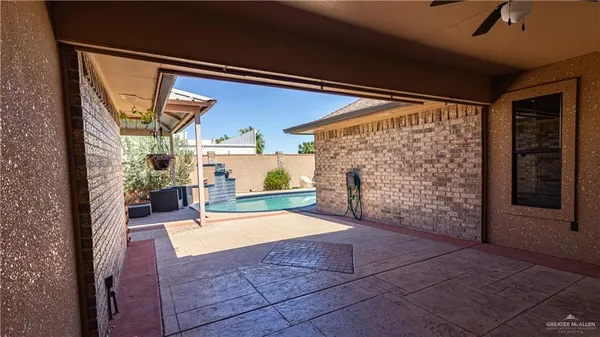 a view of a backyard of the house