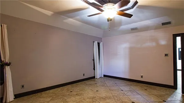 a bathroom with a tub and shower