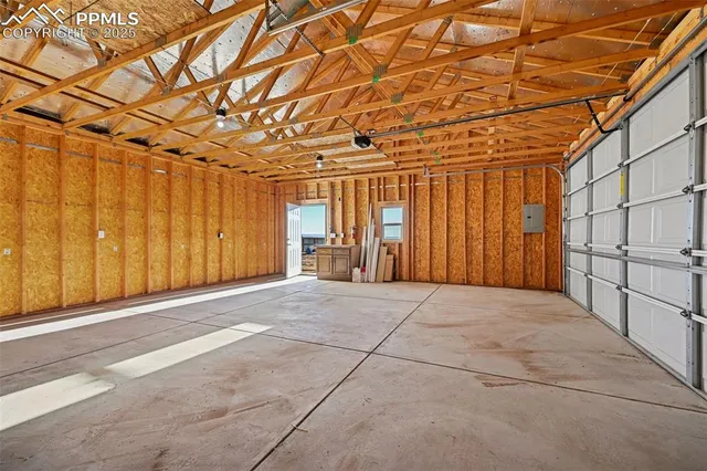 a view of a room with wooden walls