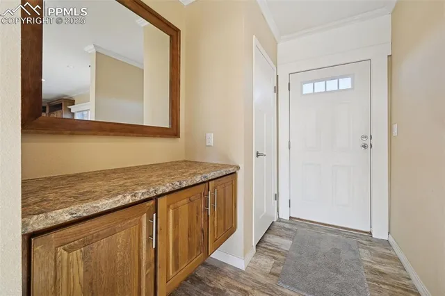 a view of livingroom with fireplace wooden floor and window