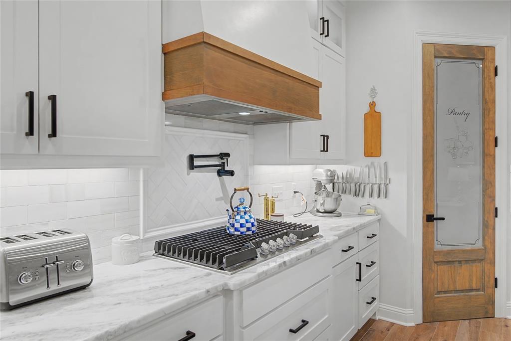 347 Ridge Drive Stonewall, LA 71078 - Photo 15 of 39 a kitchen with a sink stove and cabinets