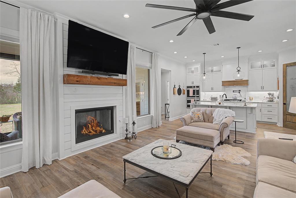 347 Ridge Drive Stonewall, LA 71078 - Photo 16 of 39 a living room with furniture and a fireplace