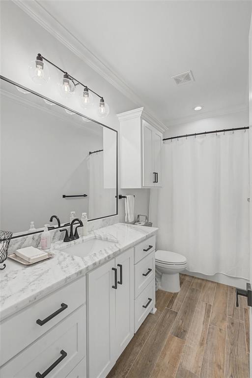 347 Ridge Drive Stonewall, LA 71078 - Photo 22 of 39 a bathroom with a granite countertop sink a toilet and a mirror