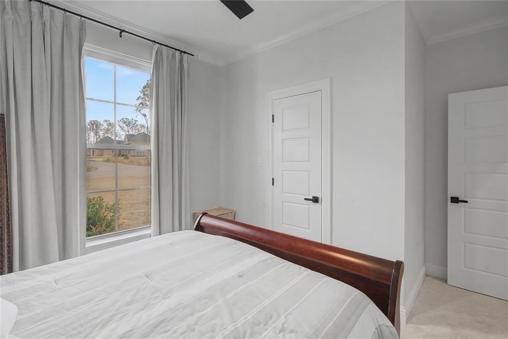 347 Ridge Drive Stonewall, LA 71078 - Photo 25 of 39 a bedroom with a bed and a window